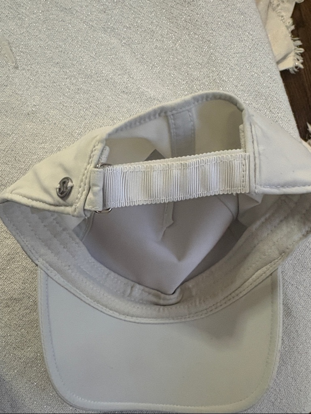 lululemon athletica cream visor with metal logo